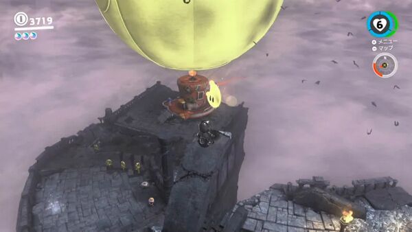 くずれた柱の上に