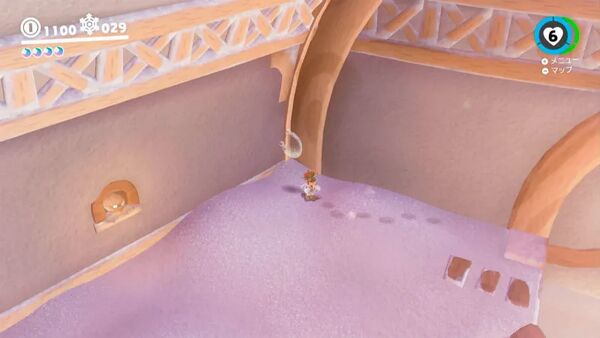 町の雪の中で 光るもの