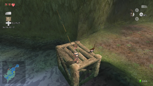 ネコの近くで魚を釣る